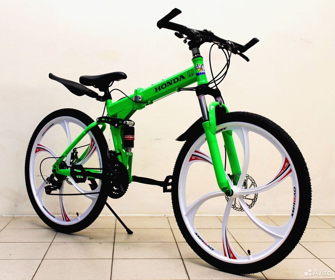 Современный велик. Велосипед зеленый Старк. Салатовый велосипед. Салатовый велосипед скоростной.