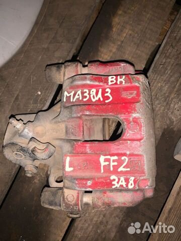 Суппорт задний левый mazda 3 bk