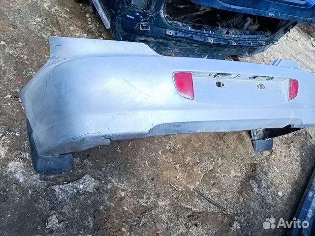 Бампер задний Kia Spectra