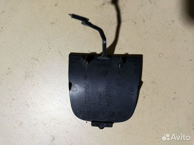 Заглушка буксировочного крюка задняя Опель Астра J Заглушка буксировочного крюка задняя Опель Астра J