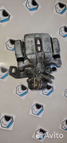 Суппорт задний, левый тормозной Хонда Цивик 4 д