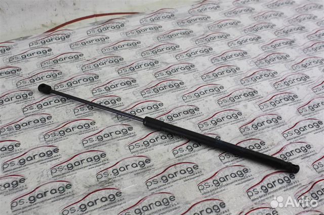 Амортизатор капота Opel Astra H