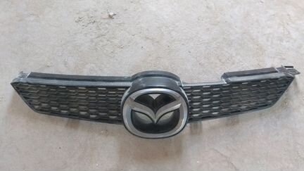 Решетка радиатора Mazda Demio dy3w