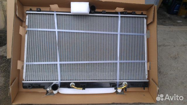 Радиатор охлаждения двигателя Лансер 9