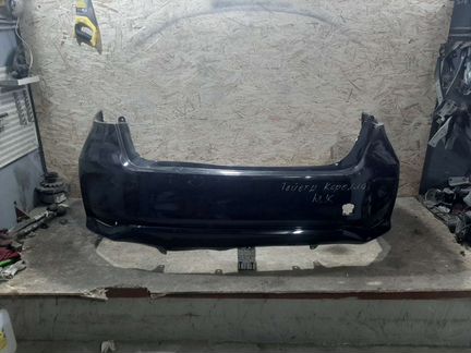 Бампер задний Toyota Corolla E210