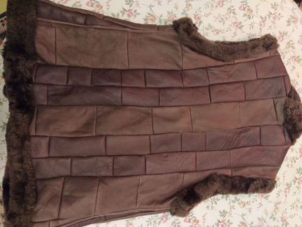 Жилетка меховая женская